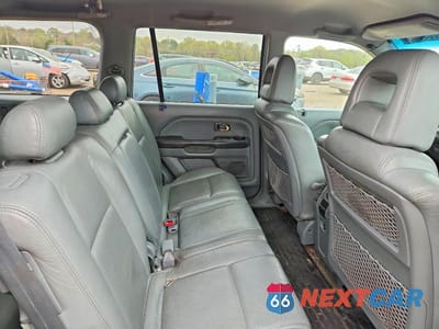 Zdjęcie 11 z 12 samochodu: 2003 HONDA PILOT EXL VIN:2HKYF18623H592184 - miniatura