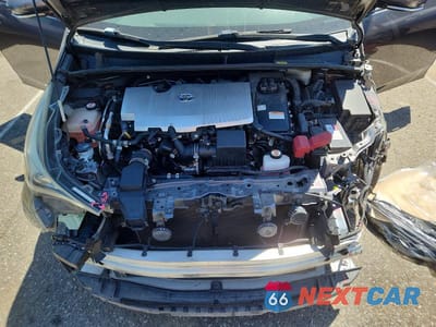Zdjęcie 11 z 13 samochodu: 2018 TOYOTA PRIUS TWO VIN:JTDKBRFUXJ3585851 - miniatura
