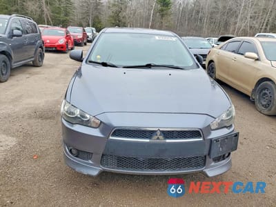 Piąte zdjęcie samochodu w środku: 2009 MITSUBISHI LANCER ES VIN:JA3AU26U59U607868 - miniatura