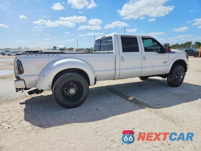 Trzecie zdjęcie samochodu z tyłu: 2014 FORD F350 SUPER DUTY VIN:1FT8W3DT2EEB50998 - miniatura