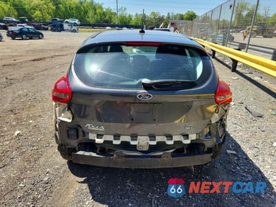 Zdjęcie 6 z 12 samochodu: 2017 FORD FOCUS SEL VIN:1FADP3M2XHL252462 - miniatura