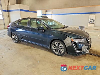 Czwarte zdjęcie samochodu z boku: 2018 HONDA CLARITY TOURING VIN:JHMZC5F31JC005784 - miniatura