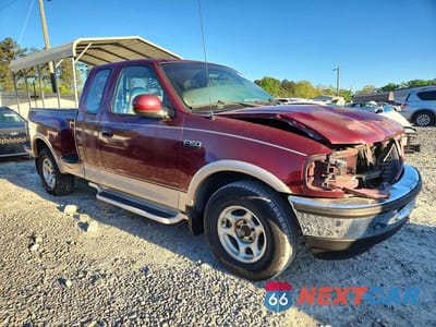 Czwarte zdjęcie samochodu z boku: 1997 FORD F150 VIN:1FTEX07L3VKC45663 - miniatura