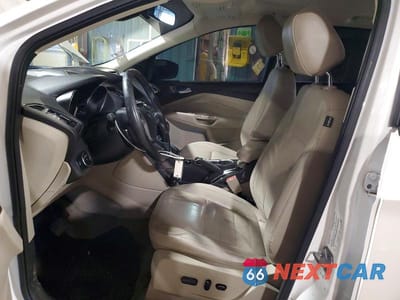 Zdjęcie 7 z 13 samochodu: 2014 FORD ESCAPE TITANIUM VIN:1FMCU9J98EUA73034 - miniatura