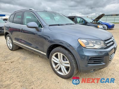 Czwarte zdjęcie samochodu z boku: 2012 VOLKSWAGEN TOUAREG V6 VIN:WVGEF9BPXCD009638 - miniatura