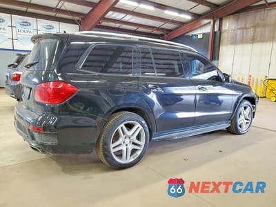 Trzecie zdjęcie samochodu z tyłu: 2015 MERCEDES-BENZ GL 550 4MATIC VIN:4JGDF7DEXFA453510 - miniatura