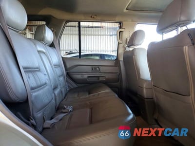 Zdjęcie 11 z 13 samochodu: 2004 NISSAN PATHFINDER SE VIN:JN8DR09Y44W920852 - miniatura