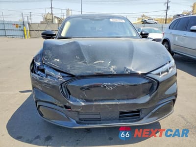Piąte zdjęcie samochodu w środku: 2025 FORD MUSTANG MACH-E PREMIUM VIN:3FMTK3R79SMA35236 - miniatura