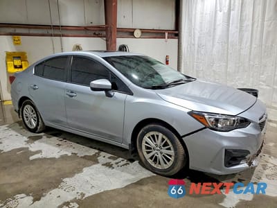 Czwarte zdjęcie samochodu z boku: 2017 SUBARU IMPREZA PREMIUM PLUS VIN:4S3GKAD66H3625753 - miniatura