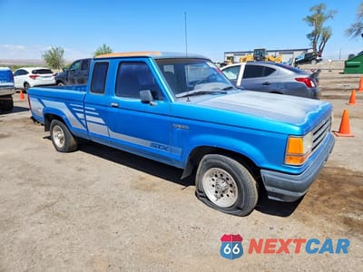 Czwarte zdjęcie samochodu z boku: 1992 FORD RANGER VIN:1FTCR14U0NPA30572 - miniatura