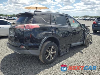 Trzecie zdjęcie samochodu z tyłu: 2017 TOYOTA RAV4 XLE VIN:2T3WFREV2HW350092 - miniatura