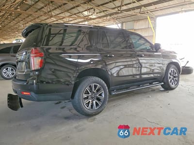 Trzecie zdjęcie samochodu z tyłu: 2024 CHEVROLET TAHOE K1500 Z71 VIN:1GNSKPKD3RR205839 - miniatura