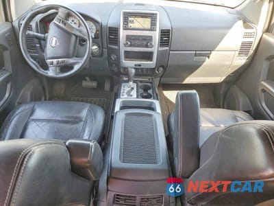 Zdjęcie 8 z 12 samochodu: 2015 NISSAN TITAN PRO-4X VIN:1N6AA0EC2FN500819 - miniatura