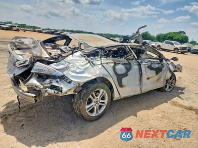 Trzecie zdjęcie samochodu z tyłu: 2018 FORD FUSION SE VIN:3FA6P0HD5JR228371 - miniatura