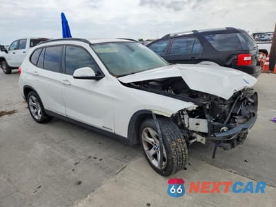 Czwarte zdjęcie samochodu z boku: 2014 BMW X1 SDRIVE28I VIN:WBAVM1C55EVW55091 - miniatura