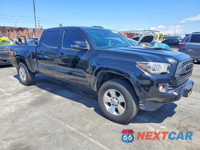 Czwarte zdjęcie samochodu z boku: 2019 TOYOTA TACOMA TRD SPORT VIN:3TMBZ5DN8KM022815 - miniatura