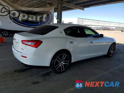Trzecie zdjęcie samochodu z tyłu: 2015 MASERATI GHIBLI S VIN:ZAM57RTA9F1131002 - miniatura