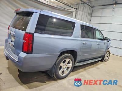 Trzecie zdjęcie samochodu z tyłu: 2016 CHEVROLET SUBURBAN K1500 LTZ VIN:1GNSKJKC1GR101951 - miniatura