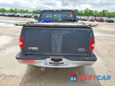 Zdjęcie 6 z 12 samochodu: 1999 FORD F150 VIN:1FTRX07L2XKA58693 - miniatura