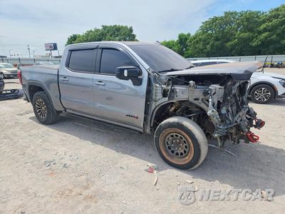 Czwarte zdjęcie samochodu z boku: 2021 GMC SIERRA K1500 AT4 VIN:1GTU9EET3MZ224209 - miniatura