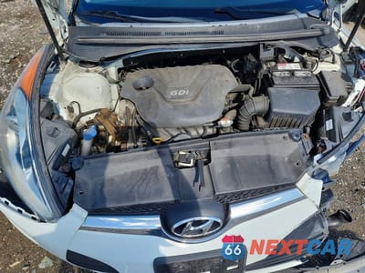 Zdjęcie 11 z 12 samochodu: 2014 HYUNDAI VELOSTER BASE VIN:KMHTC6AD7EU183580 - miniatura