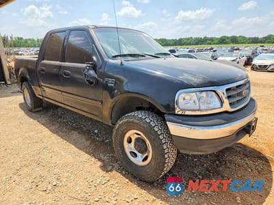 Czwarte zdjęcie samochodu z boku: 2003 FORD F150 SUPERCREW VIN:1FTRW07623KA30674 - miniatura