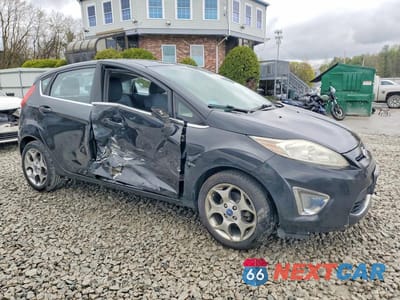 Czwarte zdjęcie samochodu z boku: 2011 FORD FIESTA VIN:3FADP4FJ5BM124260 - miniatura