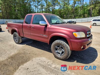 Czwarte zdjęcie samochodu z boku: 2003 TOYOTA TUNDRA ACCESS CAB SR5 VIN:5TBBT441X3S403696 - miniatura
