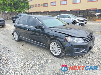 Czwarte zdjęcie samochodu z boku: 2016 VOLKSWAGEN PASSAT SE VIN:1VWBS7A36GC013166 - miniatura