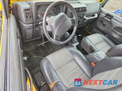 Zdjęcie 8 z 13 samochodu: 2000 JEEP WRANGLER / TJ SPORT VIN:1J4FA49S3YP749004 - miniatura