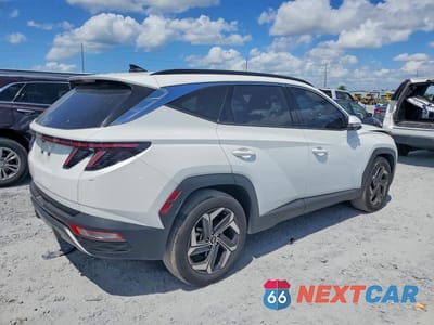 Trzecie zdjęcie samochodu z tyłu: 2023 HYUNDAI TUCSON LIMITED VIN:5NMJE3AE1PH258250 - miniatura