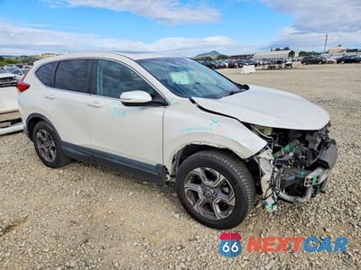 Czwarte zdjęcie samochodu z boku: 2017 HONDA CR-V EXL VIN:5J6RW1H8XHL010660 - miniatura