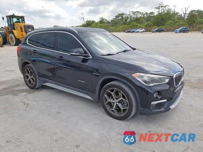 Czwarte zdjęcie samochodu z boku: 2016 BMW X1 XDRIVE28I VIN:WBXHT3Z33G4A48786 - miniatura