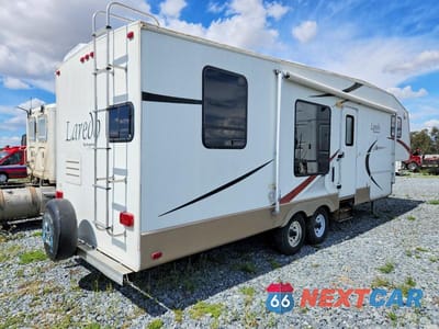 Czwarte zdjęcie samochodu z boku: 2005 KEYSTONE LAREDO CAMPER VIN:4YDF29R205J460433 - miniatura