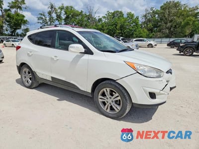 Czwarte zdjęcie samochodu z boku: 2012 HYUNDAI TUCSON GLS VIN:KM8JU3AC7CU443449 - miniatura