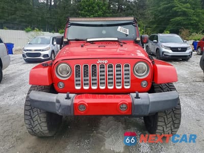 Piąte zdjęcie samochodu w środku: 2016 JEEP WRANGLER UNLIMITED SAHARA VIN:1C4BJWEGXGL115678 - miniatura