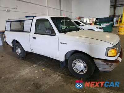 Czwarte zdjęcie samochodu z boku: 1997 FORD RANGER VIN:1FTCR10A1VUD33180 - miniatura