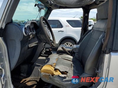 Zdjęcie 7 z 13 samochodu: 2010 JEEP WRANGLER SPORT VIN:1J4AA2D19AL119997 - miniatura