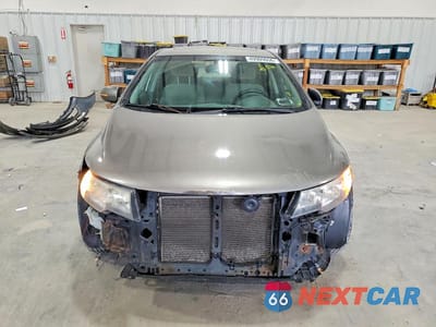 Piąte zdjęcie samochodu w środku: 2011 KIA FORTE EX VIN:KNAFU4A25B5374452 - miniatura