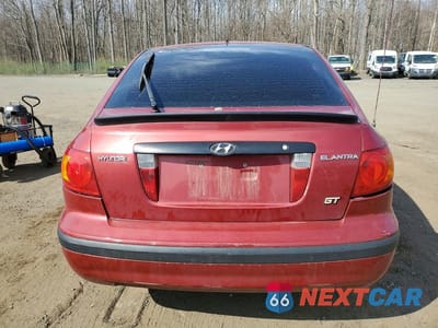 Zdjęcie 6 z 11 samochodu: 2003 HYUNDAI ELANTRA GT VIN:KMHDN55DX3U083523 - miniatura