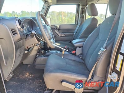 Zdjęcie 7 z 12 samochodu: 2016 JEEP WRANGLER UNLIMITED SPORT VIN:1C4BJWDG3GL196377 - miniatura