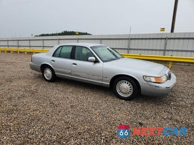 Czwarte zdjęcie samochodu z boku: 2002 MERCURY GRAND MARQUIS GS VIN:2MEFM74W82X663986 - miniatura