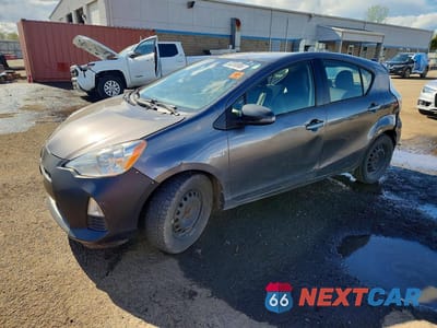 2014 TOYOTA PRIUS C TWO JTDKDTB39E1568853 - główne zdjęcie licytacji z USA - miniatura