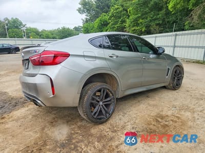 Trzecie zdjęcie samochodu z tyłu: 2019 BMW X6 M VIN:5YMKW8C52KLR38362 - miniatura