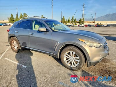 Czwarte zdjęcie samochodu z boku: 2011 INFINITI FX35 BASE VIN:JN8AS1MU2BM710390 - miniatura
