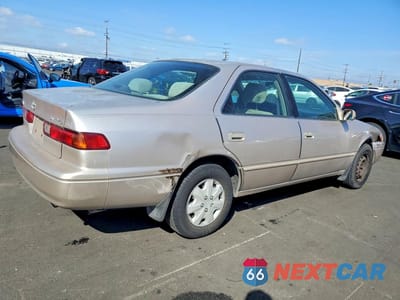 Trzecie zdjęcie samochodu z tyłu: 1999 TOYOTA CAMRY CE VIN:4T1BG22KXXU516749 - miniatura