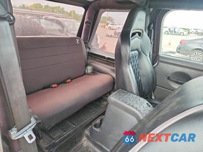 Zdjęcie 10 z 12 samochodu: 2004 JEEP WRANGLER / TJ SE VIN:1J4FA29194P724713 - miniatura