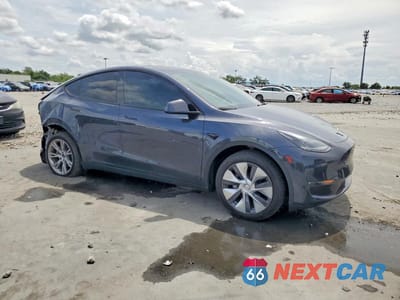 Czwarte zdjęcie samochodu z boku: 2024 TESLA MODEL Y VIN:7SAYGDEE5RA253856 - miniatura