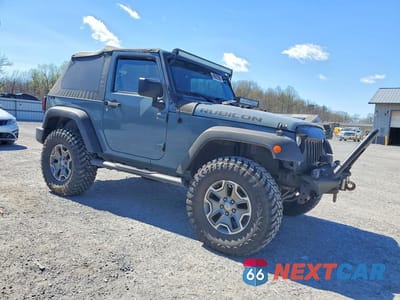 Czwarte zdjęcie samochodu z boku: 2015 JEEP WRANGLER SPORT VIN:1C4AJWAG3FL729827 - miniatura