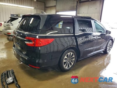 Trzecie zdjęcie samochodu z tyłu: 2021 HONDA ODYSSEY EXL VIN:5FNRL6H7XMB041651 - miniatura
